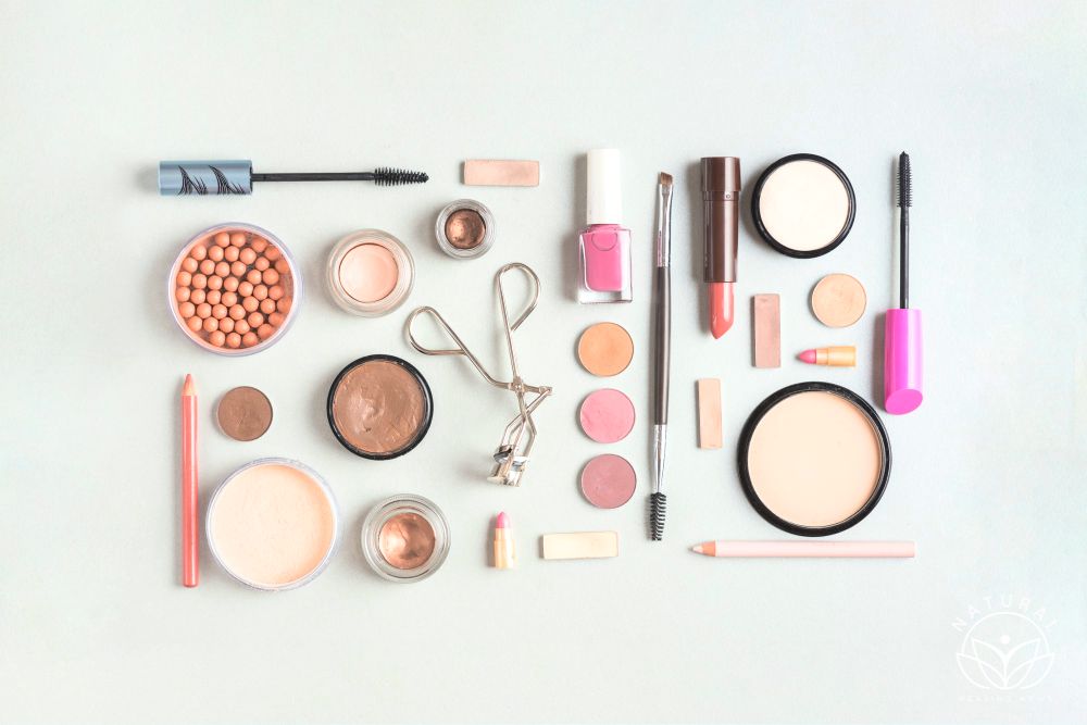 3 Ways to Make Your Morning Beauty Routine Easier, Makeup products arranged in rectangular shape on white backdrop